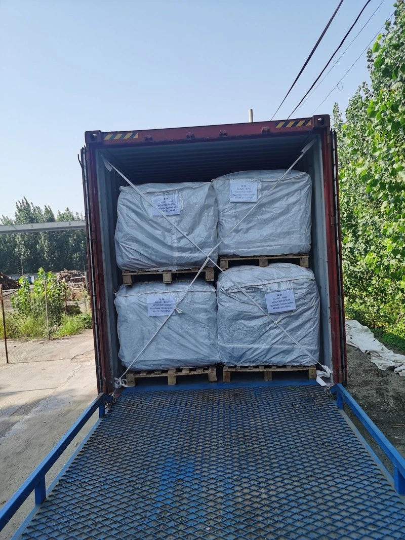 sling bags loading full into container